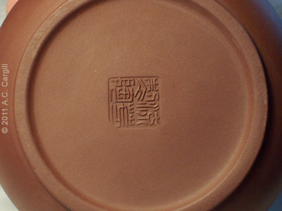Chop mark on the bottom of the teapot body