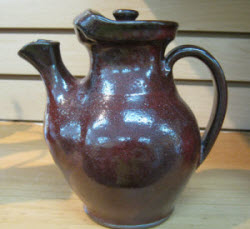 Teapot in maroon glaze